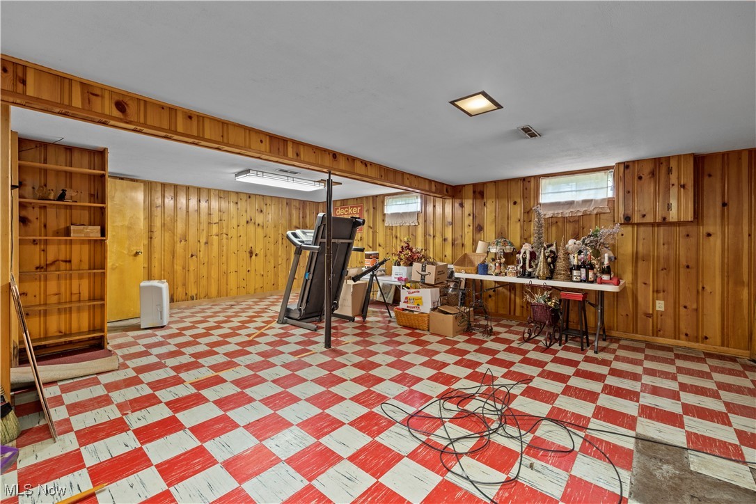 11811 Robson Road Grafton, OH 44044 - Photo 32 of 50 Basement featuring wooden walls and tile patterned floors