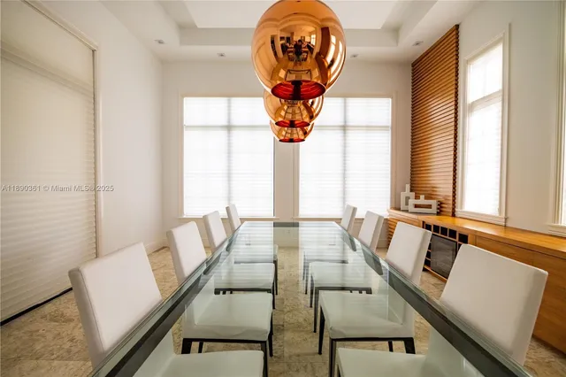 a kitchen with a sink and large window