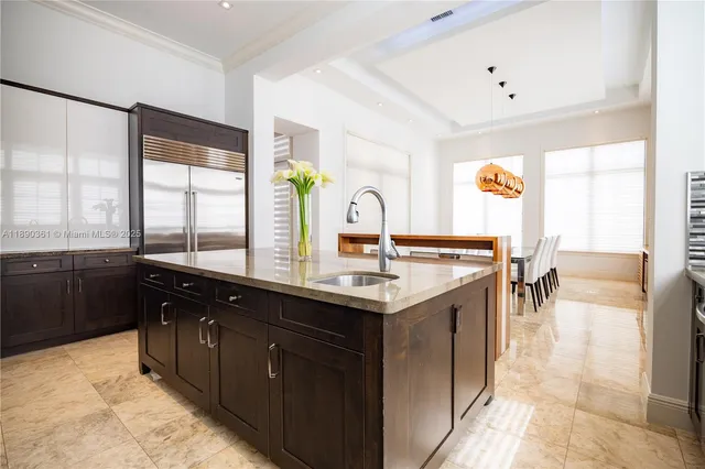 a spacious bedroom with a bed and a couch