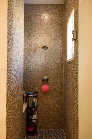 a view of swimming pool with chairs