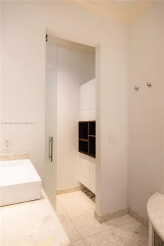 a view of a swimming pool with a garden and trees