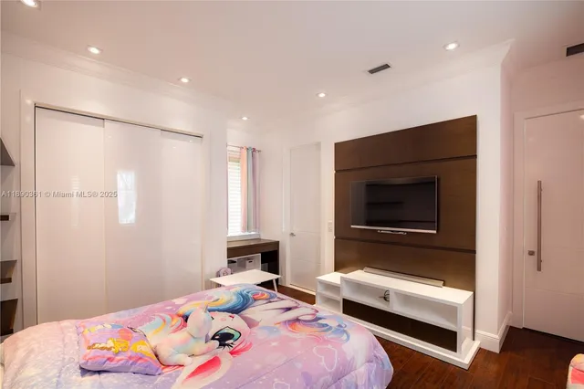 a view of a house with swimming pool and sitting area