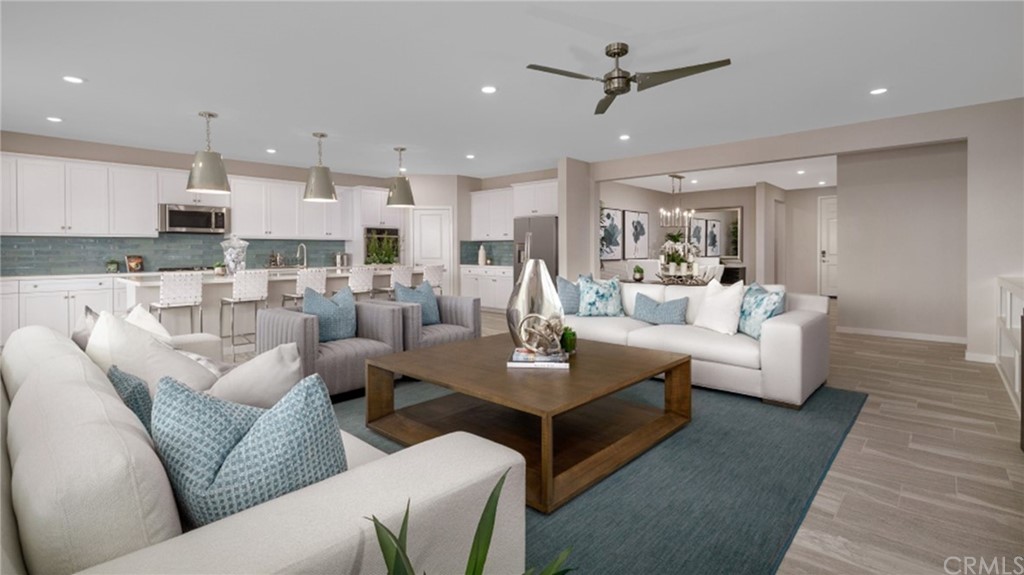 39614 Taffala Drive Indio, CA 92203 - Photo 3 of 14 a living room with furniture kitchen view and a chandelier