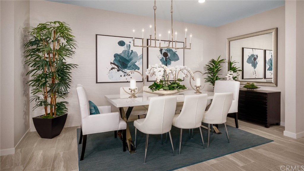 39614 Taffala Drive Indio, CA 92203 - Photo 5 of 14 a view of a dining room with furniture and chandelier
