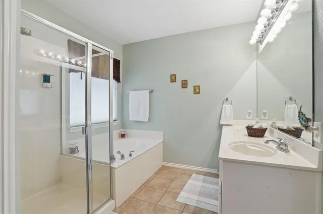 a white bath tub and shower