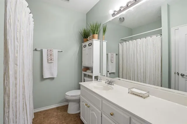 a building outdoor space with patio furniture and wooden floor