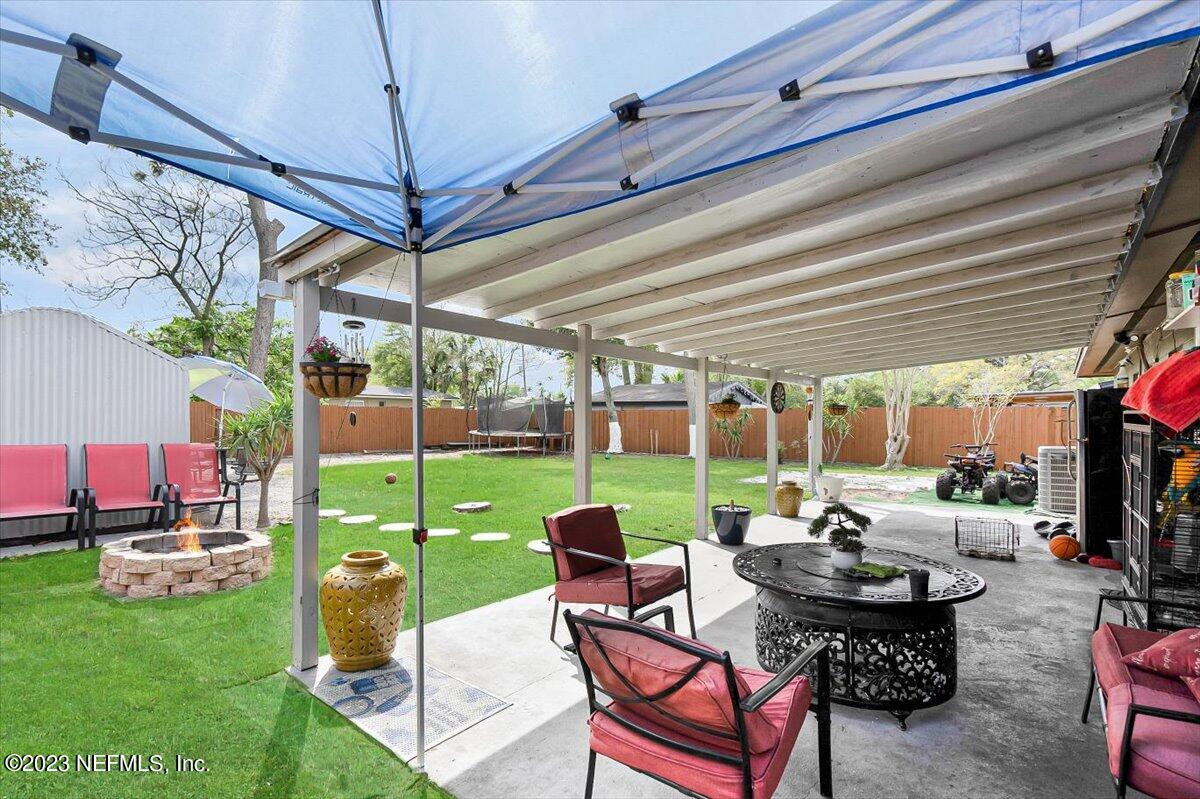 7240 Adele Court Jacksonville, FL 32277 - Photo 21 of 27 a patio with garden area and patio