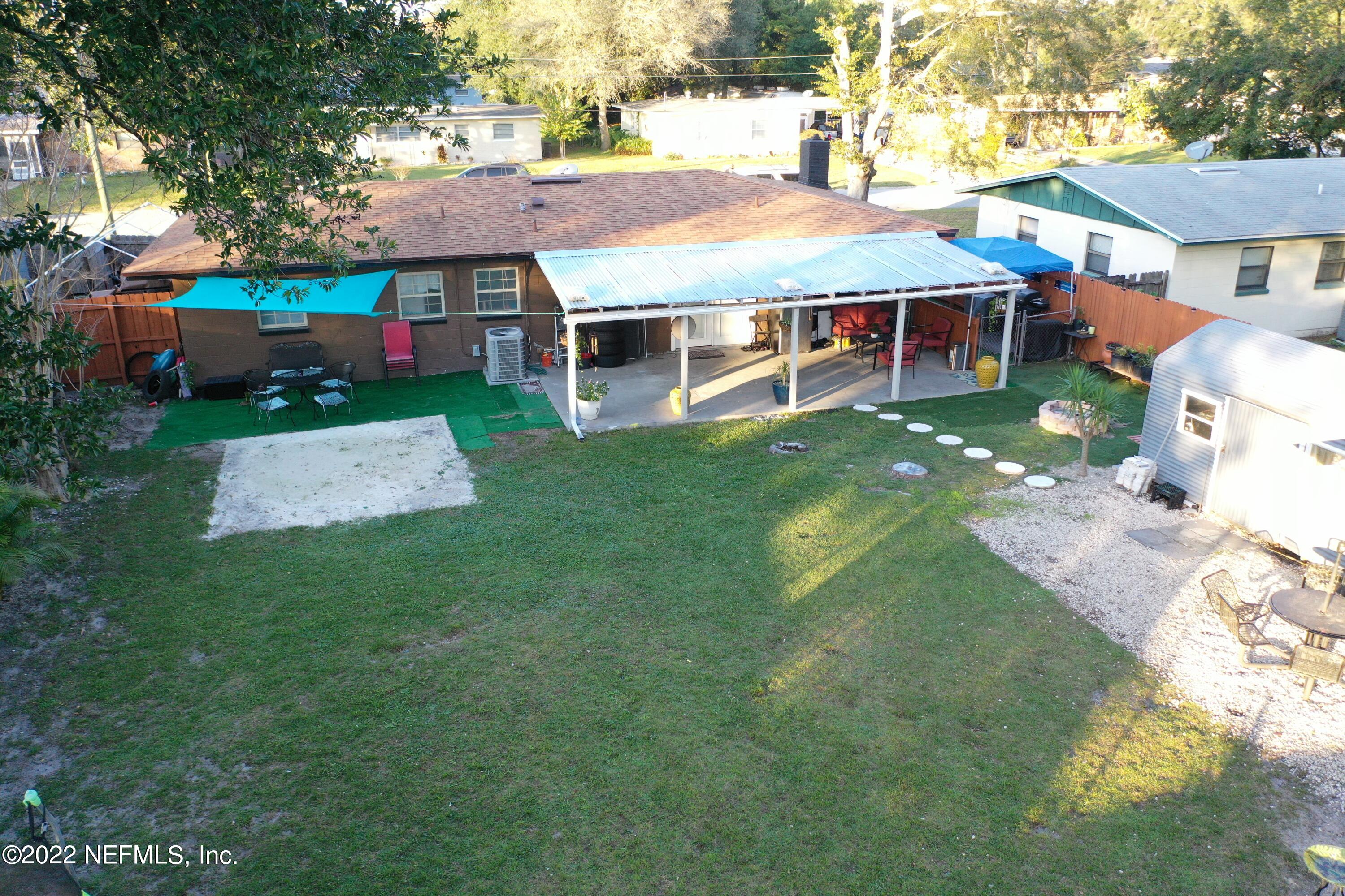 7240 Adele Court Jacksonville, FL 32277 - Photo 24 of 27 a aerial view of a house with a garden