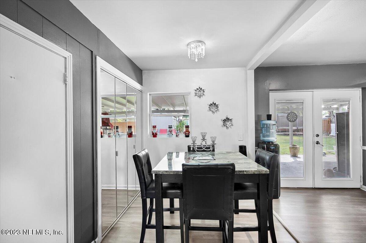 7240 Adele Court Jacksonville, FL 32277 - Photo 8 of 27 a dining room with furniture and window