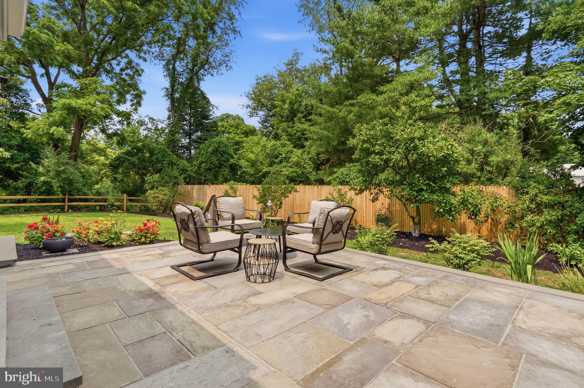 2971 Comfort Road New Hope, PA 18938 - Photo 51 of 60 a view of a patio with table and chairs potted plants and large tree