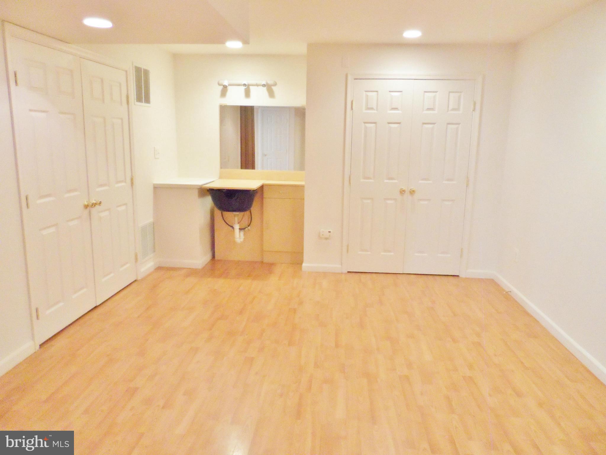 6281 Willowfield Way Springfield, VA 22150 - Photo 12 of 28 a view of a kitchen with a sink