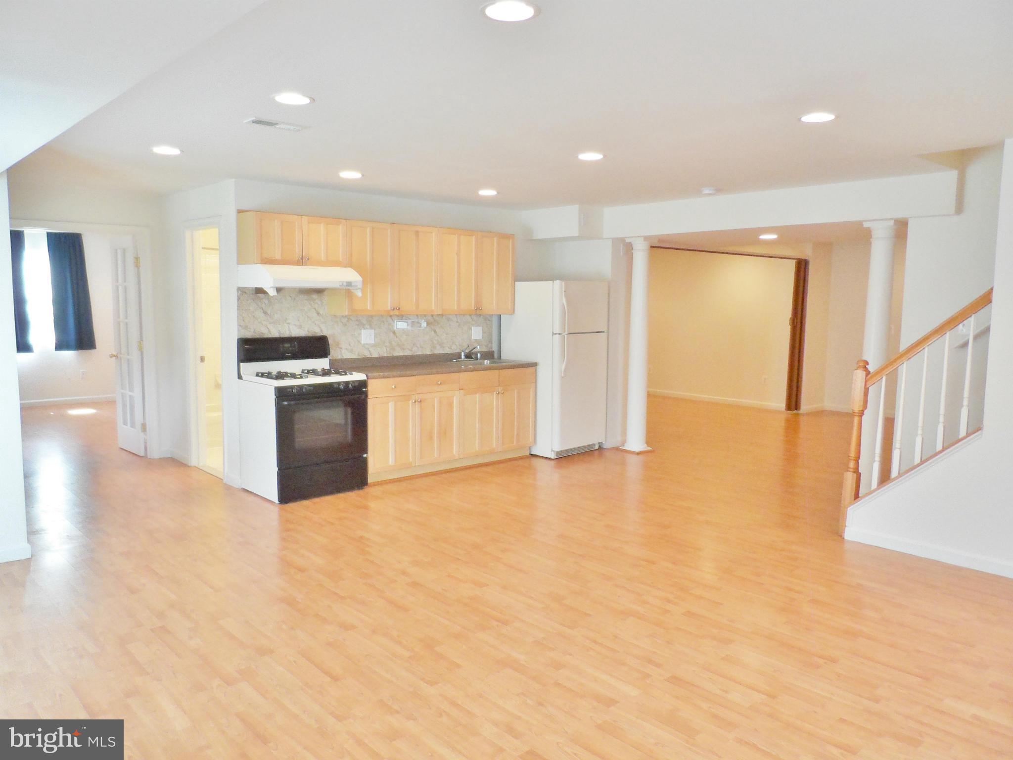 6281 Willowfield Way Springfield, VA 22150 - Photo 14 of 28 a view of a kitchen with a sink
