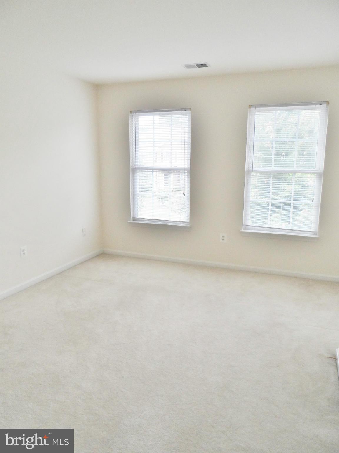 6281 Willowfield Way Springfield, VA 22150 - Photo 25 of 28 an empty room with a window