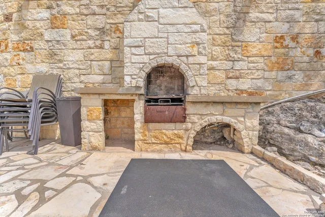 a view of a yard with large trees