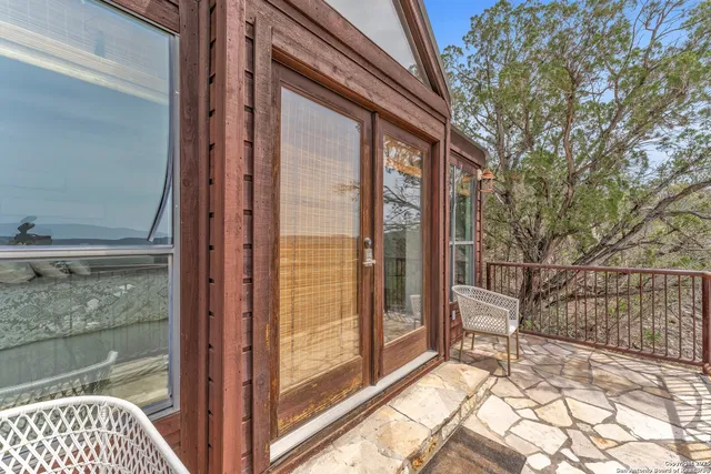 a front view of a house with a rug