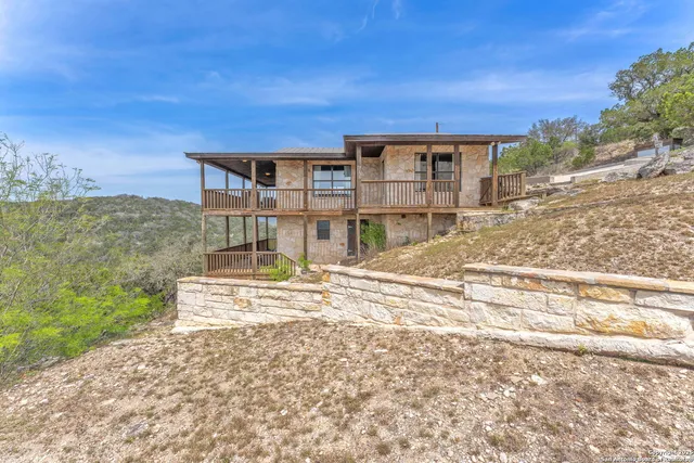 a view of a city with mountains in the background