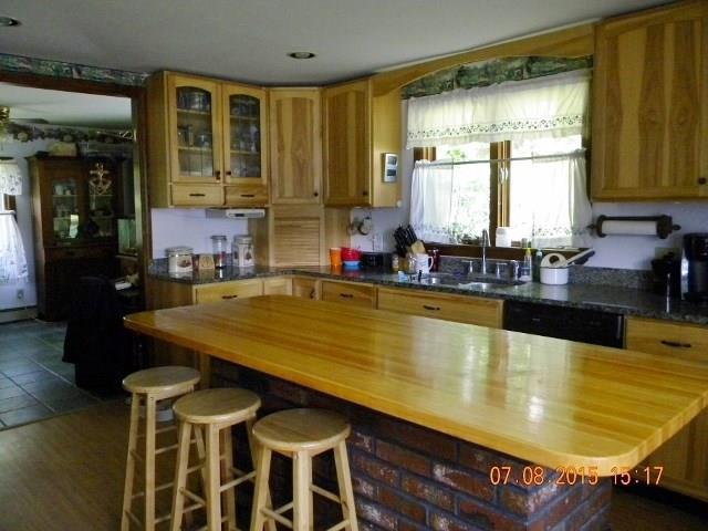 24 Ball Park Road Sabattus, ME 04280 - Photo 6 of 19 Kitchen Island and Cabinets looking...