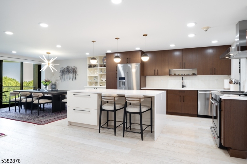 a kitchen with counter space cabinets furniture and appliances