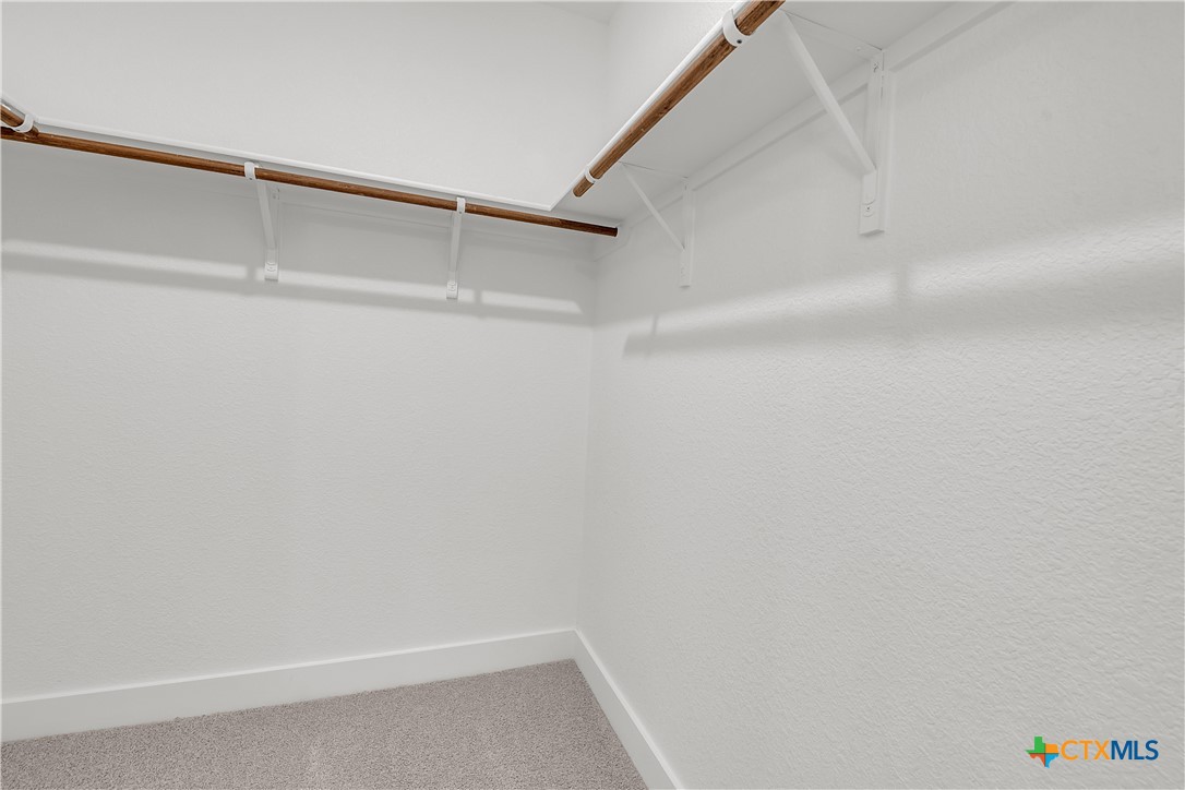 1209 Peppermint Drive Temple, TX 76501 - Photo 13 of 17 a view of small space with racks on the wall