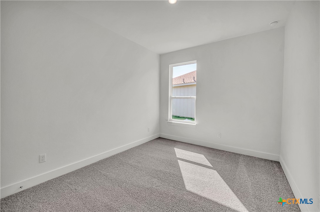 1209 Peppermint Drive Temple, TX 76501 - Photo 14 of 17 an empty room with windows