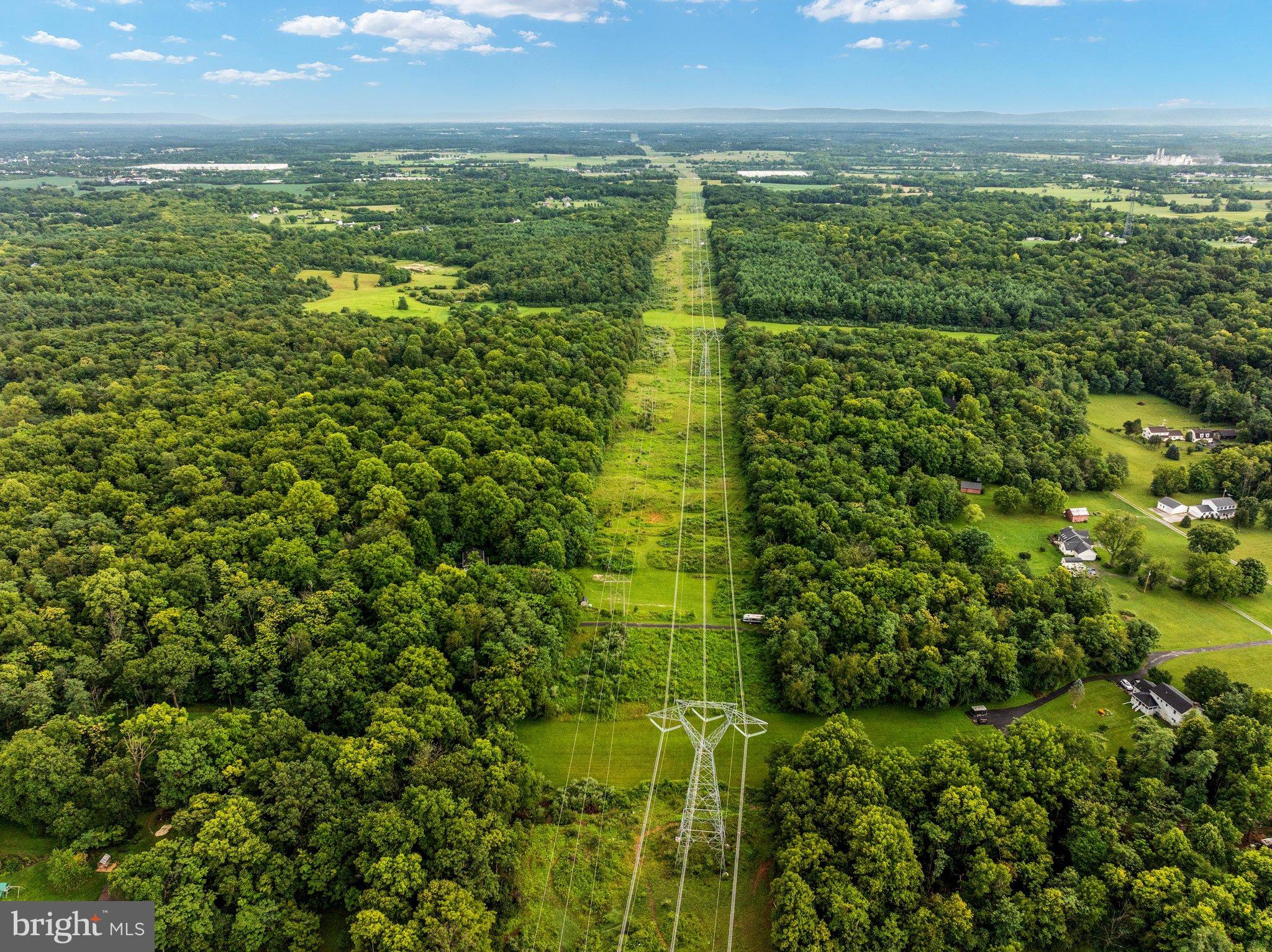 Lot 15 Rest Church Road Clear Brook, VA 22624 - Photo 29 of 29 Lush green landscape with power lines stretching.