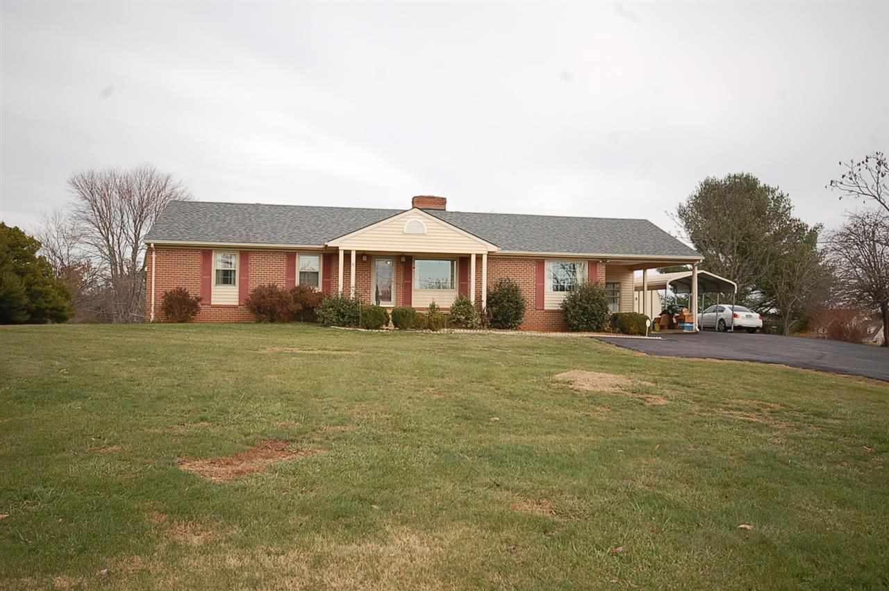 358 Cedar Grove Road Ruckersville, VA 22968 - Photo 1 of 22 a front view of a house with a garden