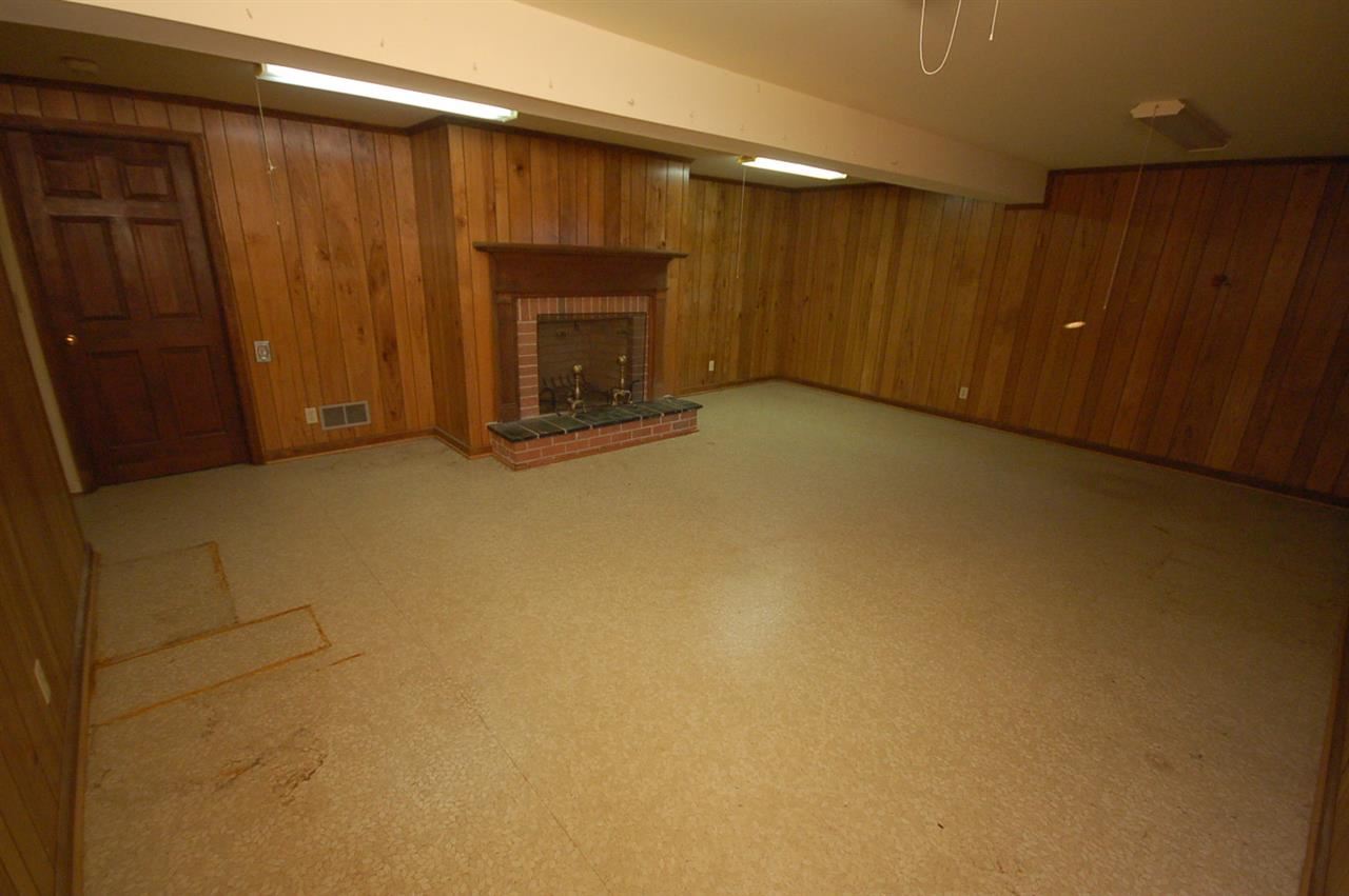 358 Cedar Grove Road Ruckersville, VA 22968 - Photo 15 of 22 a view of an empty room with a fireplace