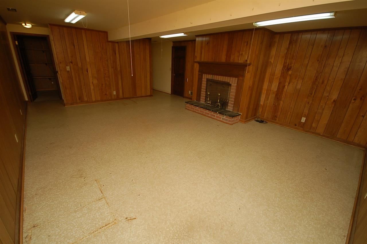 358 Cedar Grove Road Ruckersville, VA 22968 - Photo 16 of 22 a view of an empty room with a fireplace
