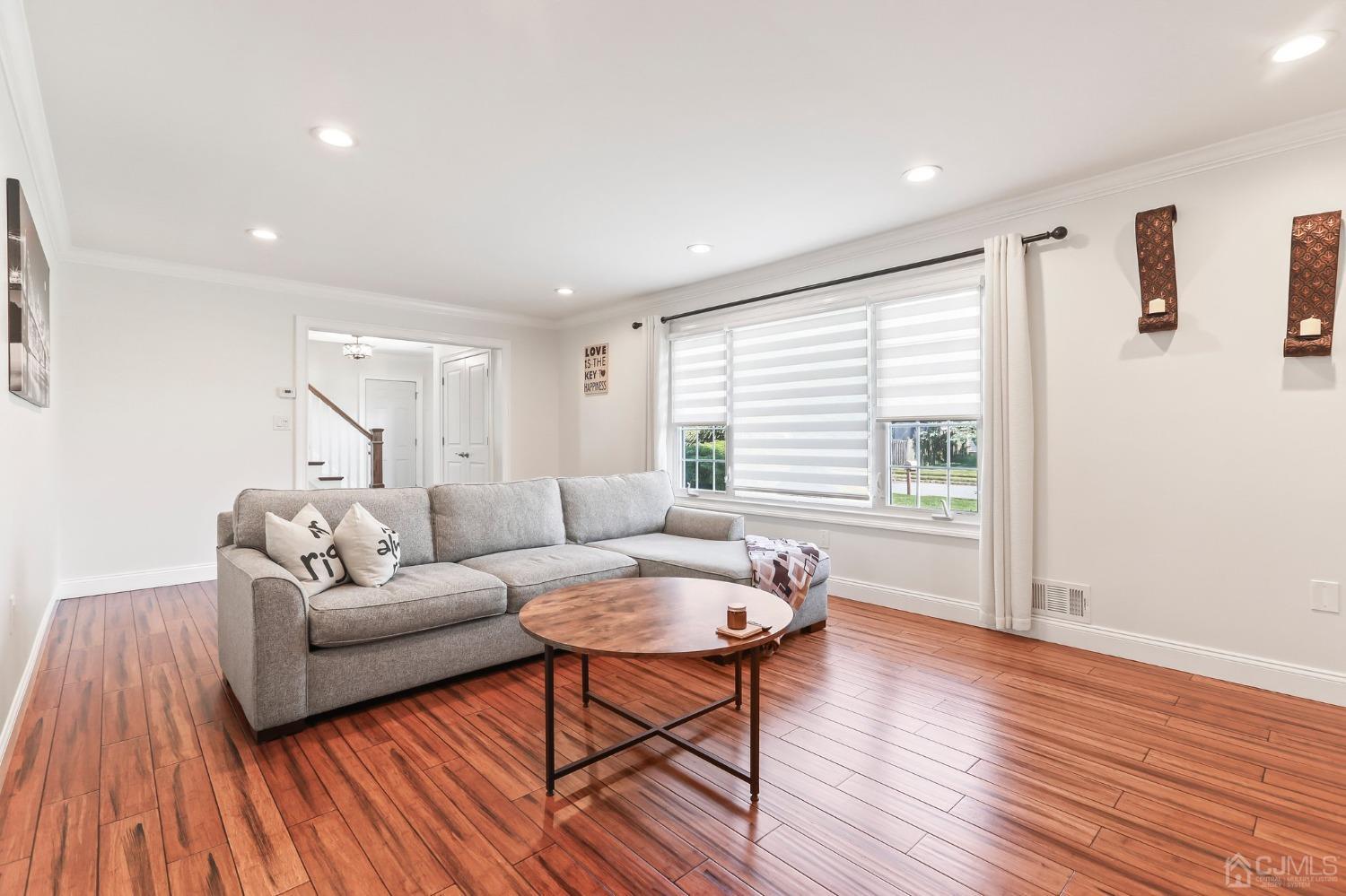7 Mountbatten Drive Old Bridge, NJ 08857 - Photo 11 of 42 a living room with furniture and a wooden floor