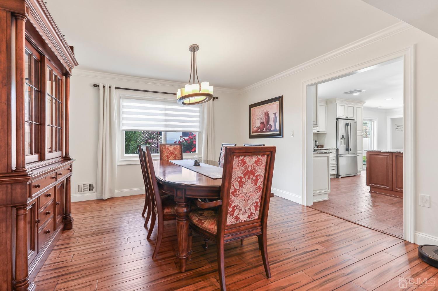 7 Mountbatten Drive Old Bridge, NJ 08857 - Photo 13 of 42 a view of a dining room with furniture window and wooden floor