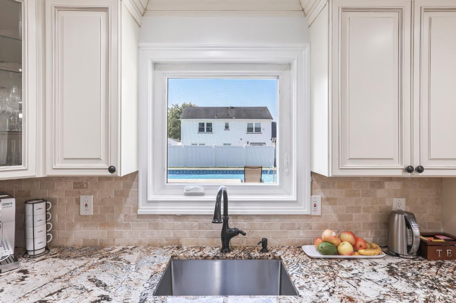7 Mountbatten Drive Old Bridge, NJ 08857 - Photo 15 of 42 a kitchen with granite countertop a sink and a stove
