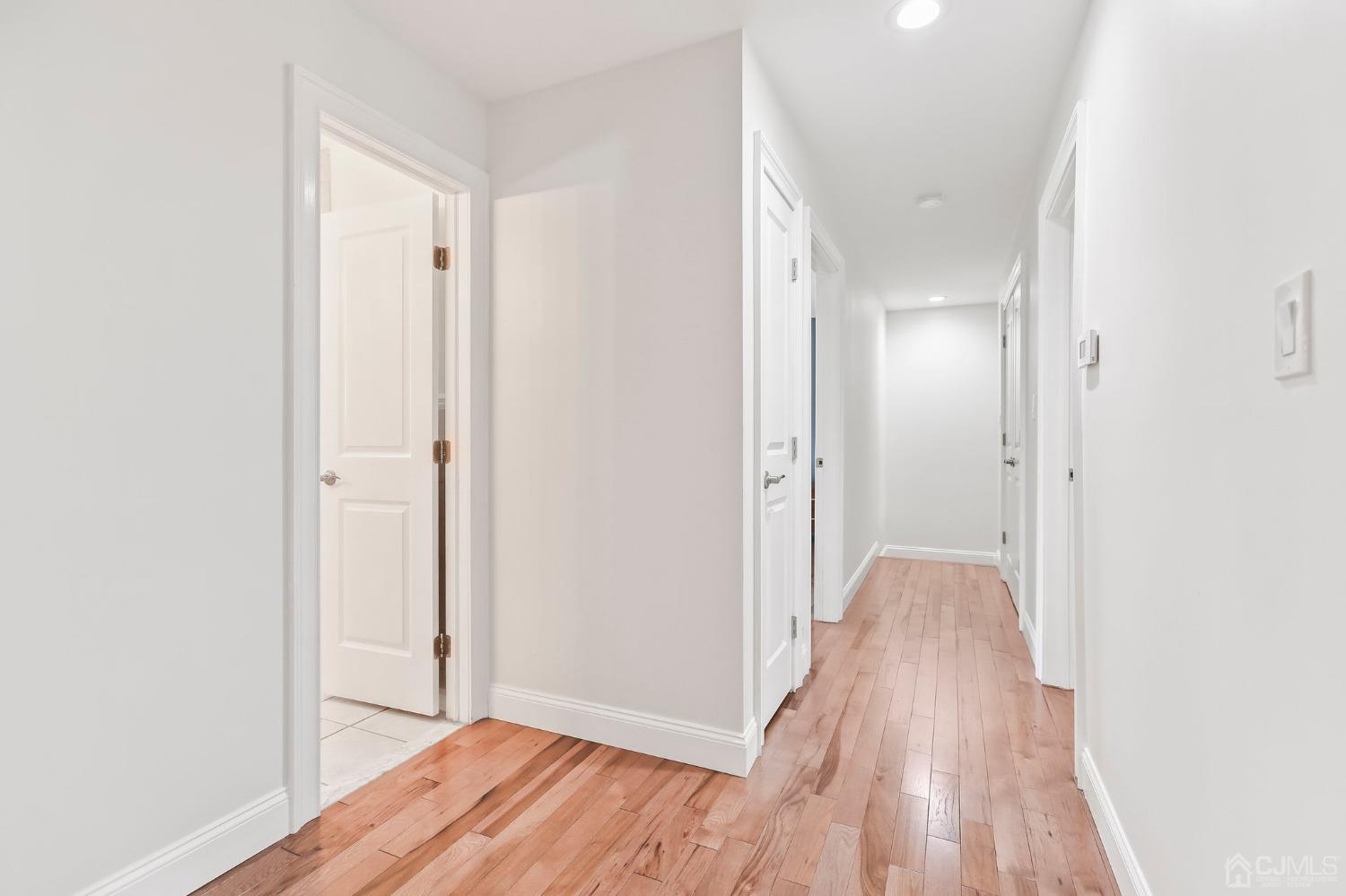 7 Mountbatten Drive Old Bridge, NJ 08857 - Photo 25 of 42 a view of hallway with wooden floor