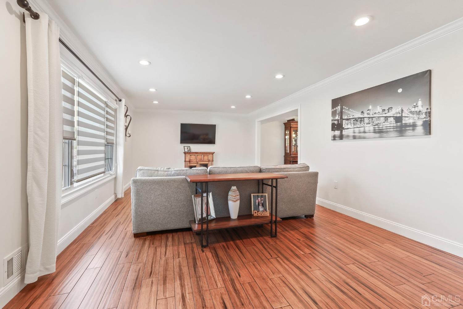 7 Mountbatten Drive Old Bridge, NJ 08857 - Photo 10 of 42 a living room with furniture and a wooden floor