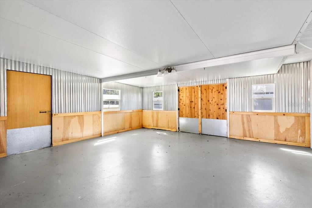 1436 Mardrake Road Daytona Beach, FL 32114 - Photo 21 of 37 a view of an empty room with a window