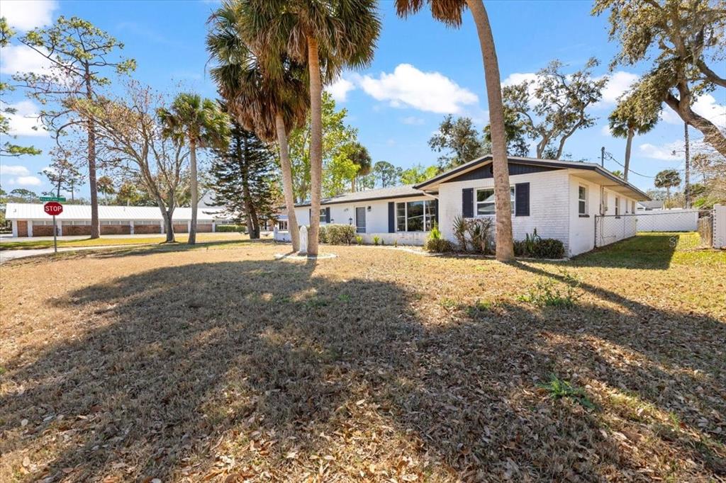 1436 Mardrake Road Daytona Beach, FL 32114 - Photo 30 of 37 a view of a yard in front of a house