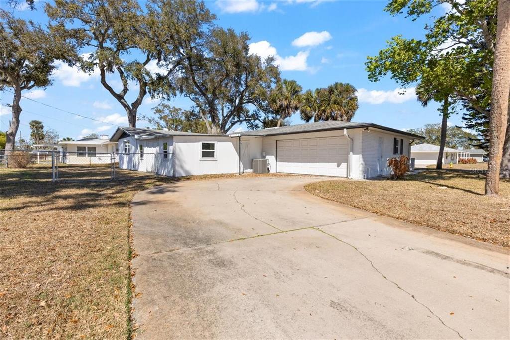 1436 Mardrake Road Daytona Beach, FL 32114 - Photo 31 of 37 a view of a house with a yard and tree