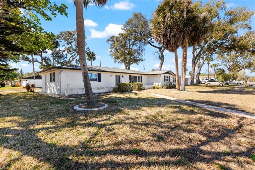 1436 Mardrake Road Daytona Beach, FL 32114 - Photo 35 of 37 a house view with a backyard space