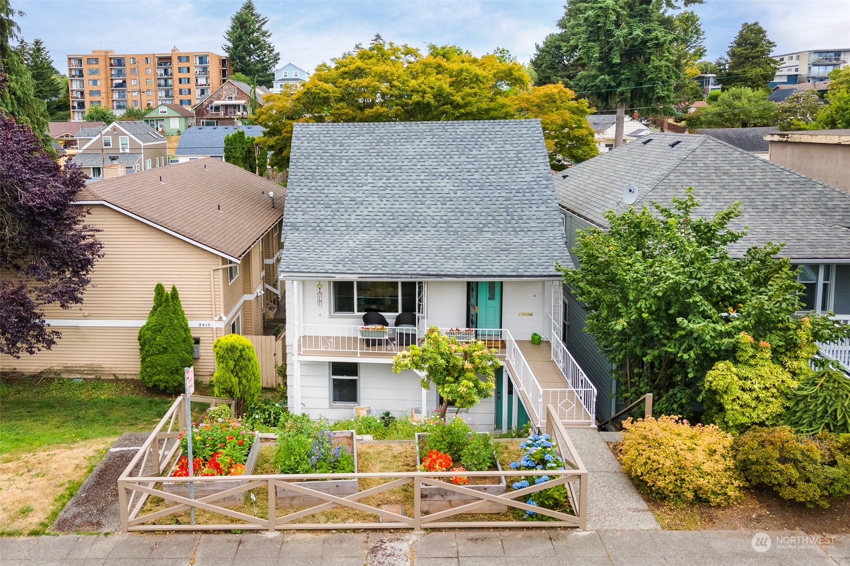 front view of a house with a yard