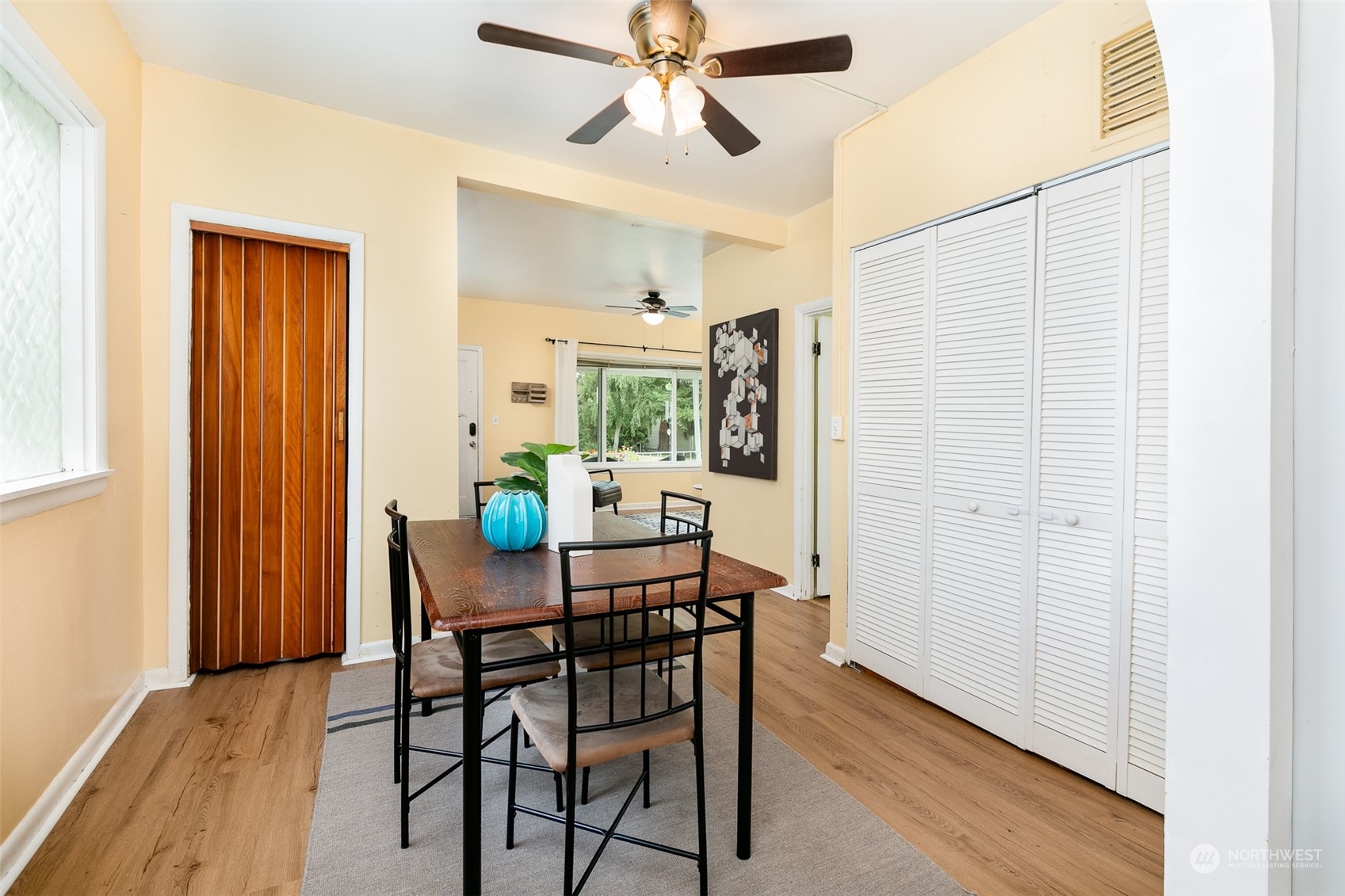 3408 Rockefeller Avenue Everett, WA 98201 - Photo 11 of 36 a view of a dining room with furniture and window
