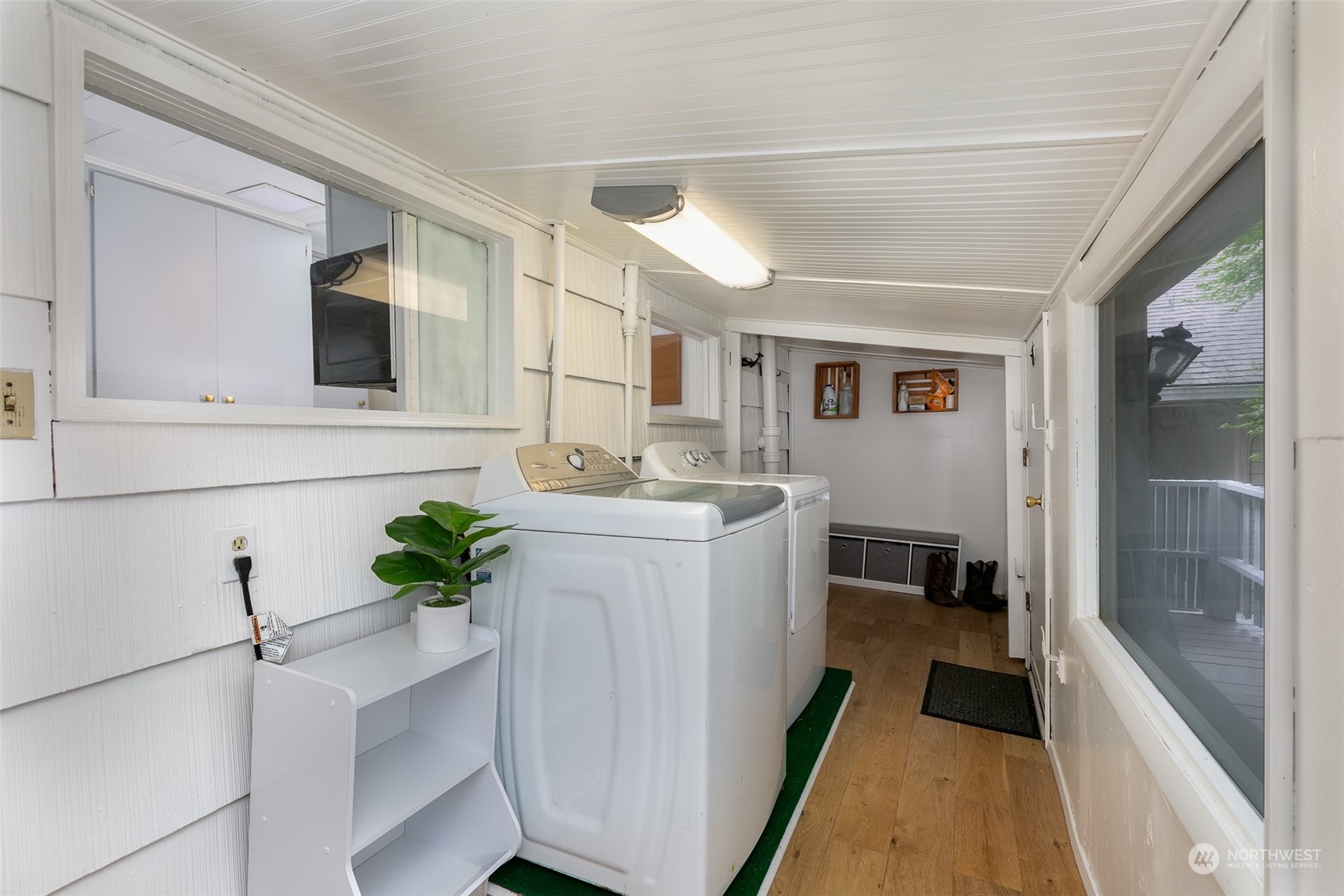 3408 Rockefeller Avenue Everett, WA 98201 - Photo 15 of 36 a bathroom with a sink a mirror and a bathtub