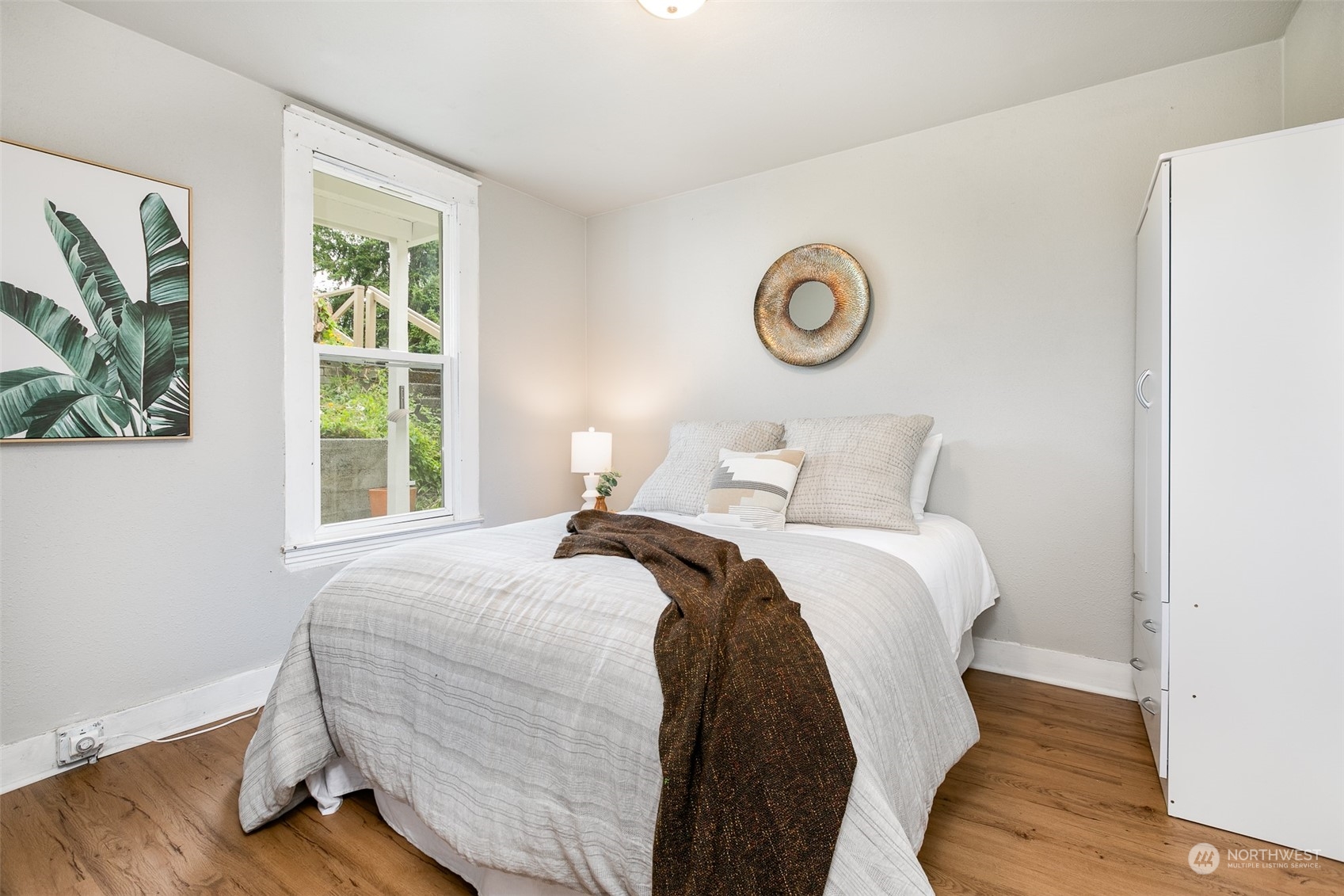 3408 Rockefeller Avenue Everett, WA 98201 - Photo 19 of 36 a bedroom with a bed and a window
