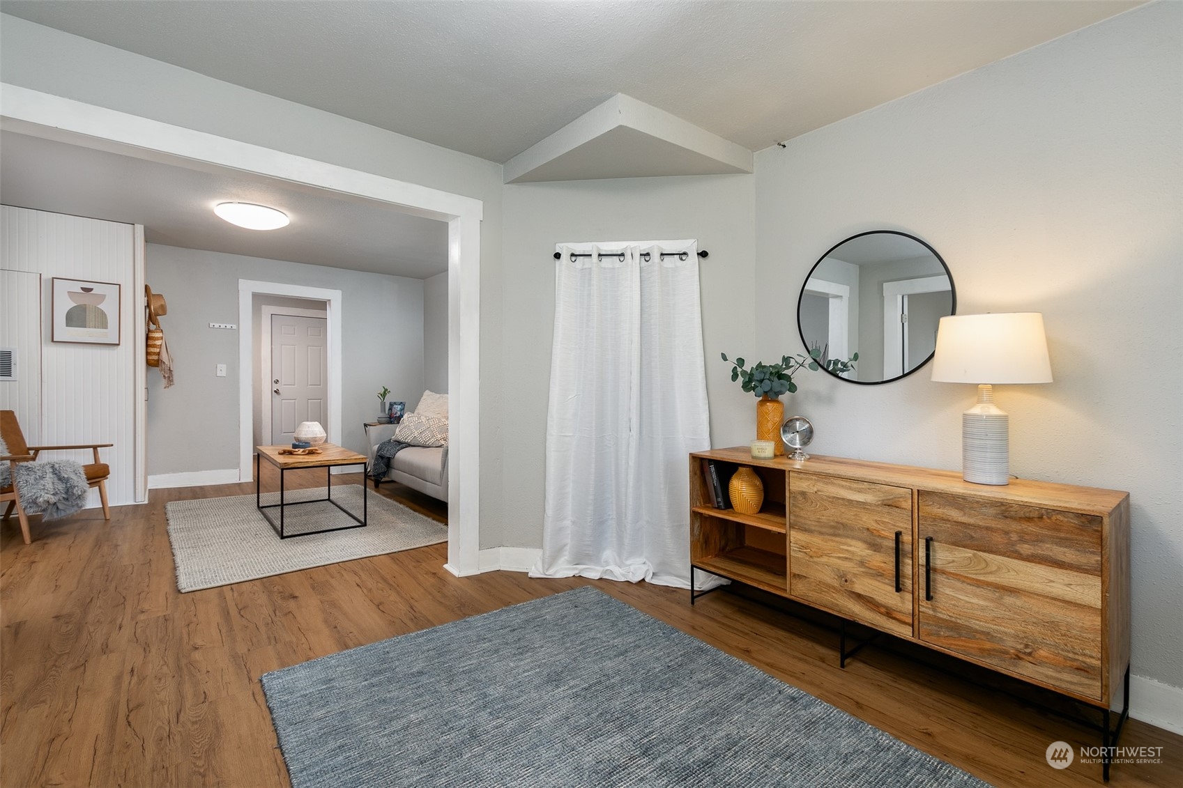 3408 Rockefeller Avenue Everett, WA 98201 - Photo 20 of 36 a living room with furniture and a wooden floor