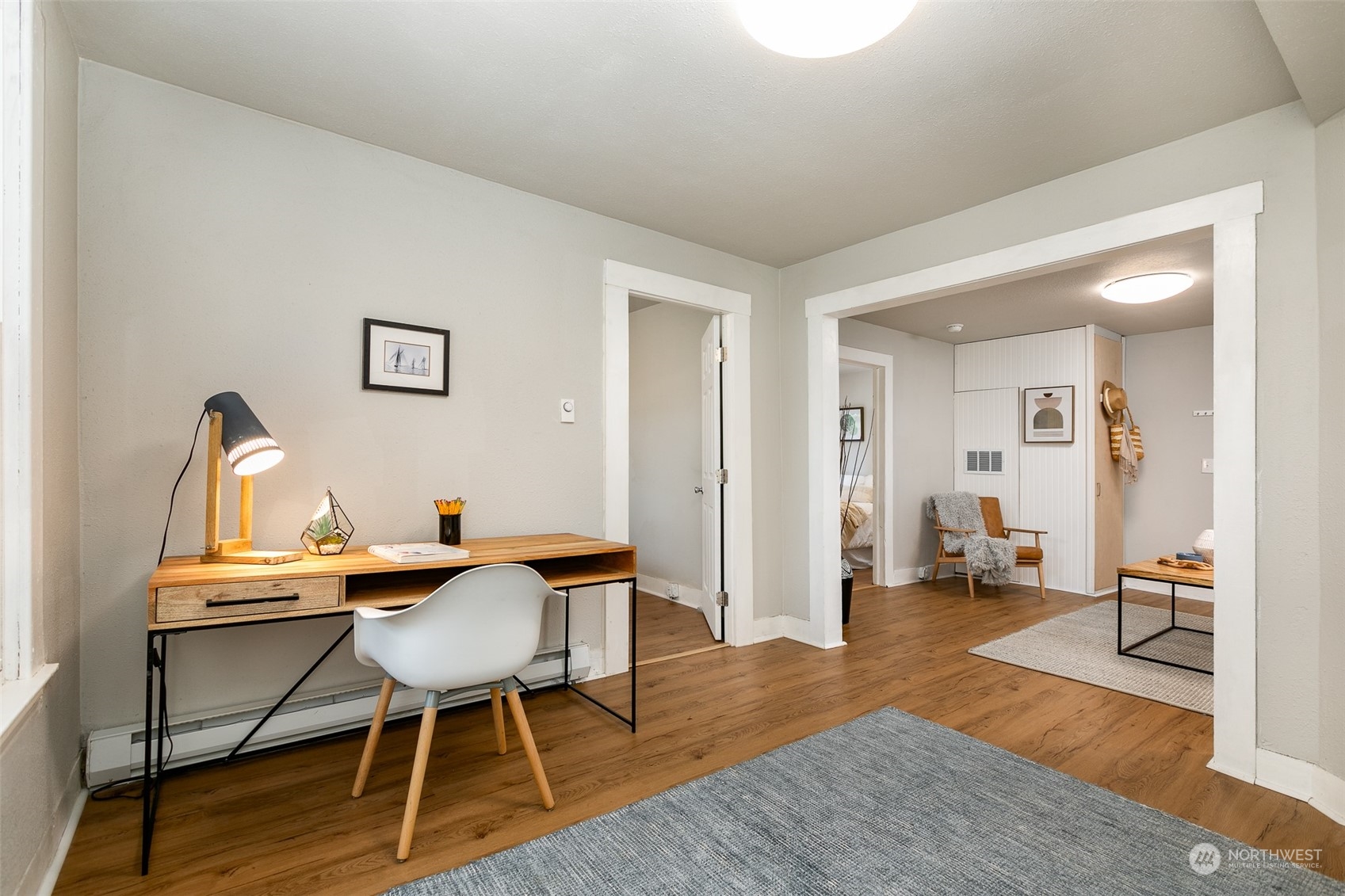 3408 Rockefeller Avenue Everett, WA 98201 - Photo 21 of 36 a workspace with furniture and wooden floor