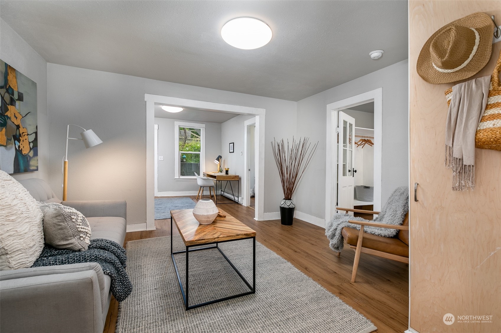 3408 Rockefeller Avenue Everett, WA 98201 - Photo 23 of 36 a living room with furniture a rug and a window