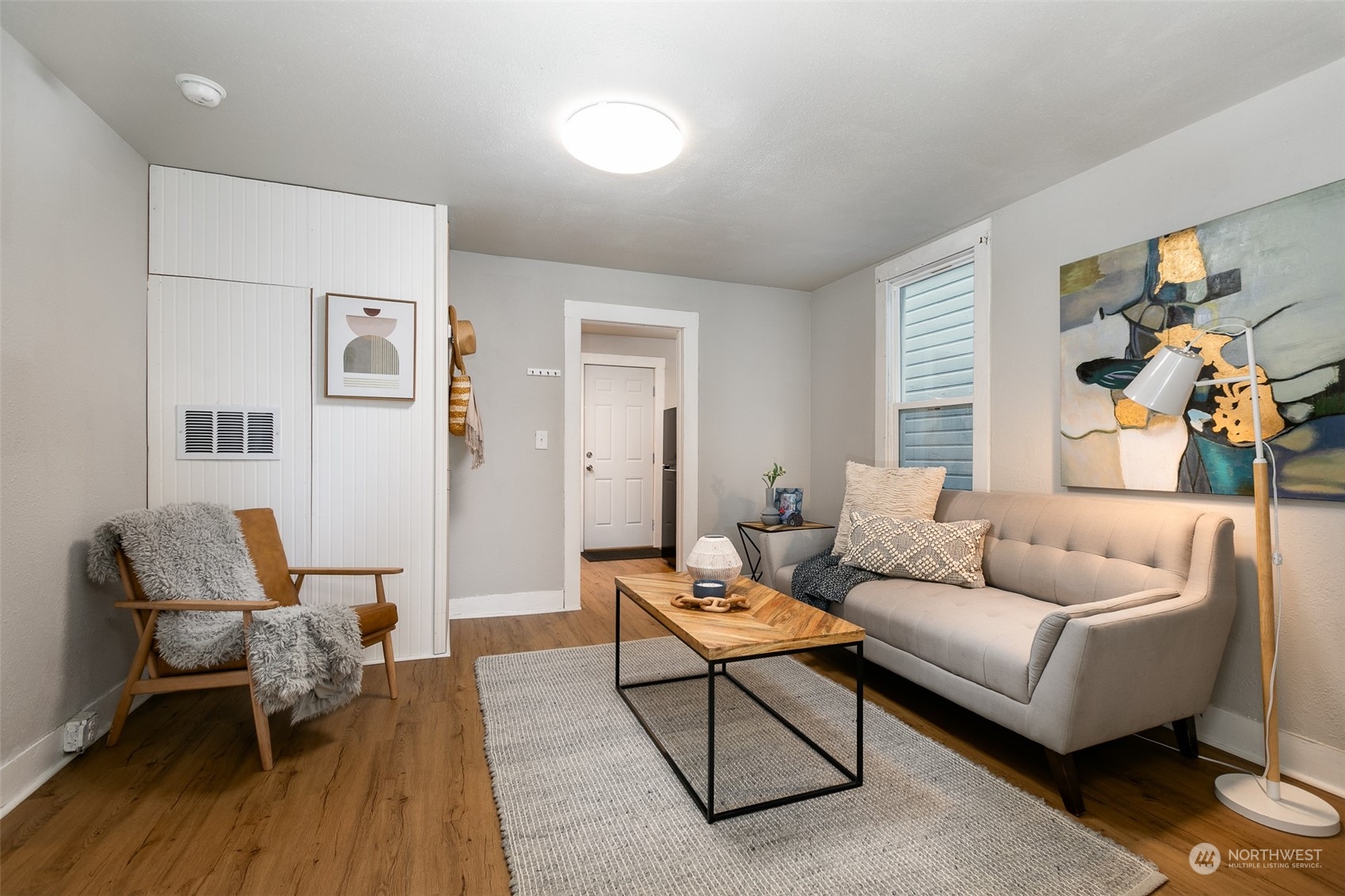 3408 Rockefeller Avenue Everett, WA 98201 - Photo 24 of 36 a living room with furniture and wooden floor