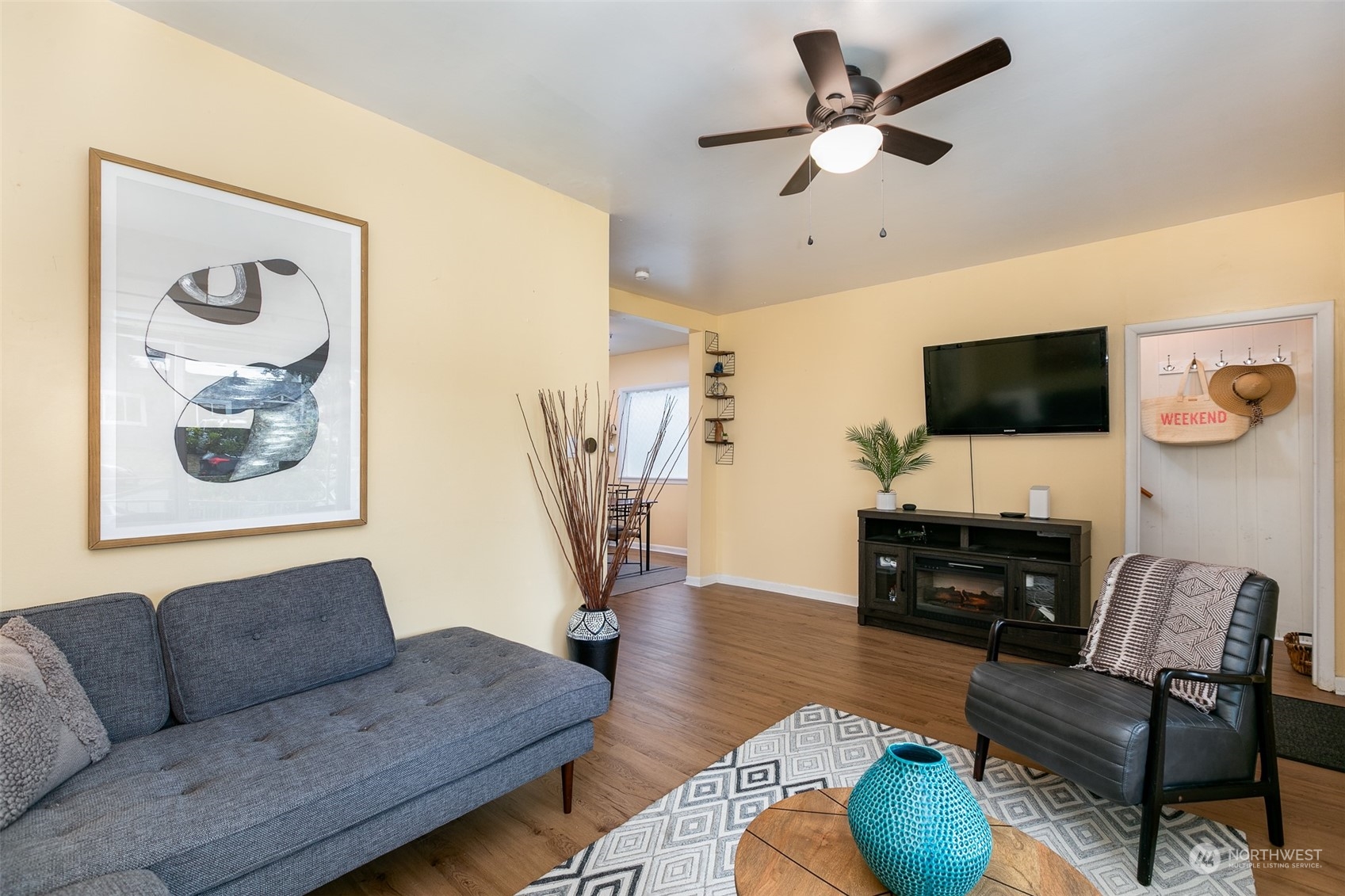 3408 Rockefeller Avenue Everett, WA 98201 - Photo 4 of 36 a living room with furniture and a flat screen tv