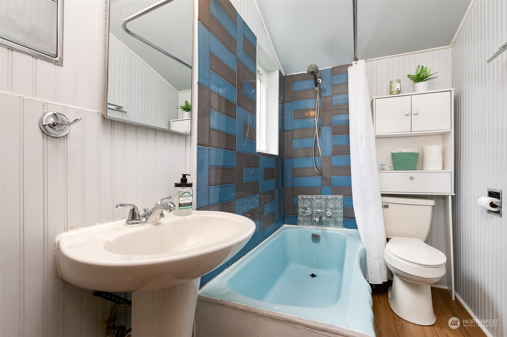 3408 Rockefeller Avenue Everett, WA 98201 - Photo 9 of 36 a bathroom with a sink toilet and shower