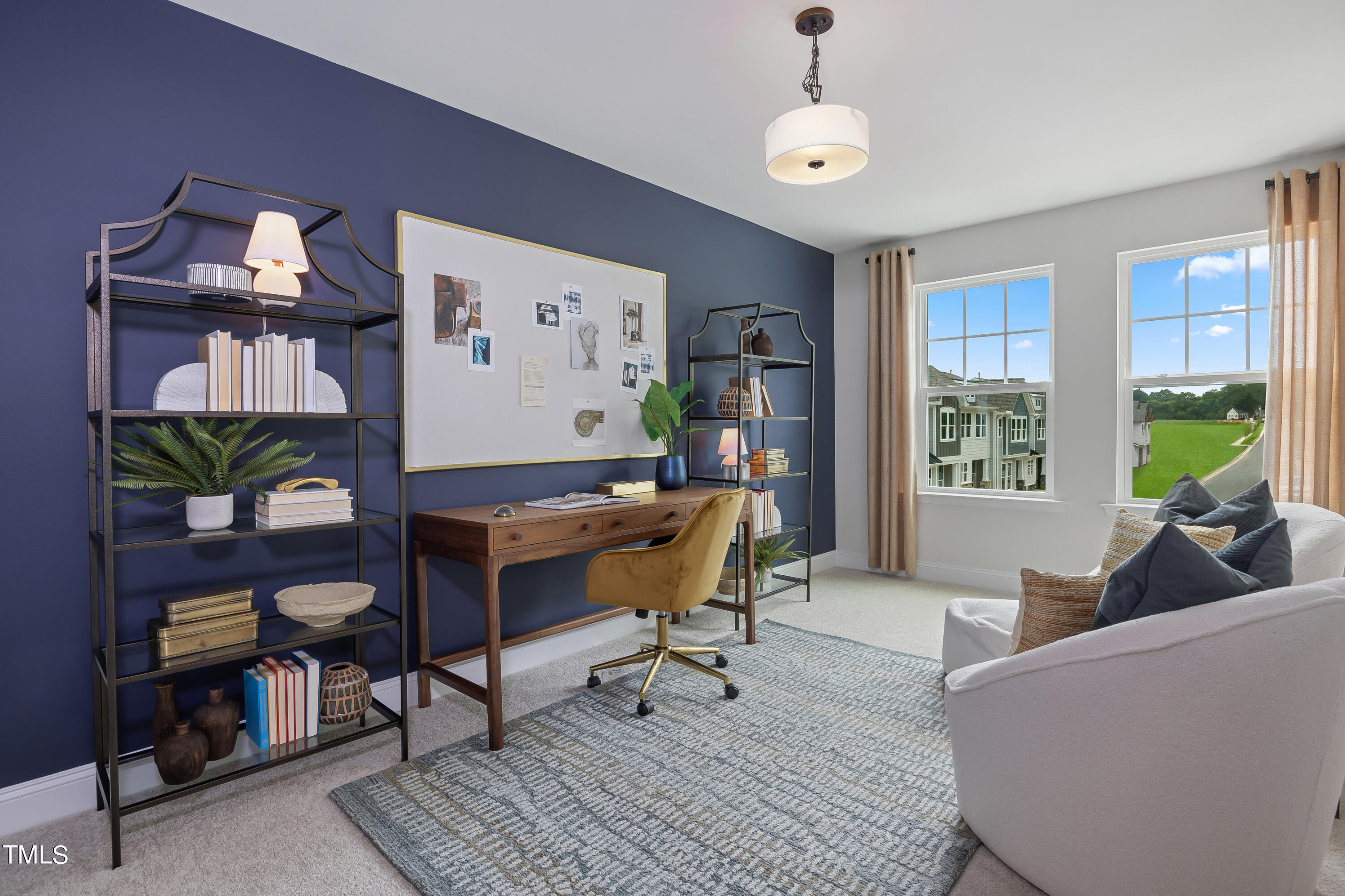 4910 Caddis Bend Raleigh, NC 27604 - Photo 27 of 30 a living room with furniture and a window