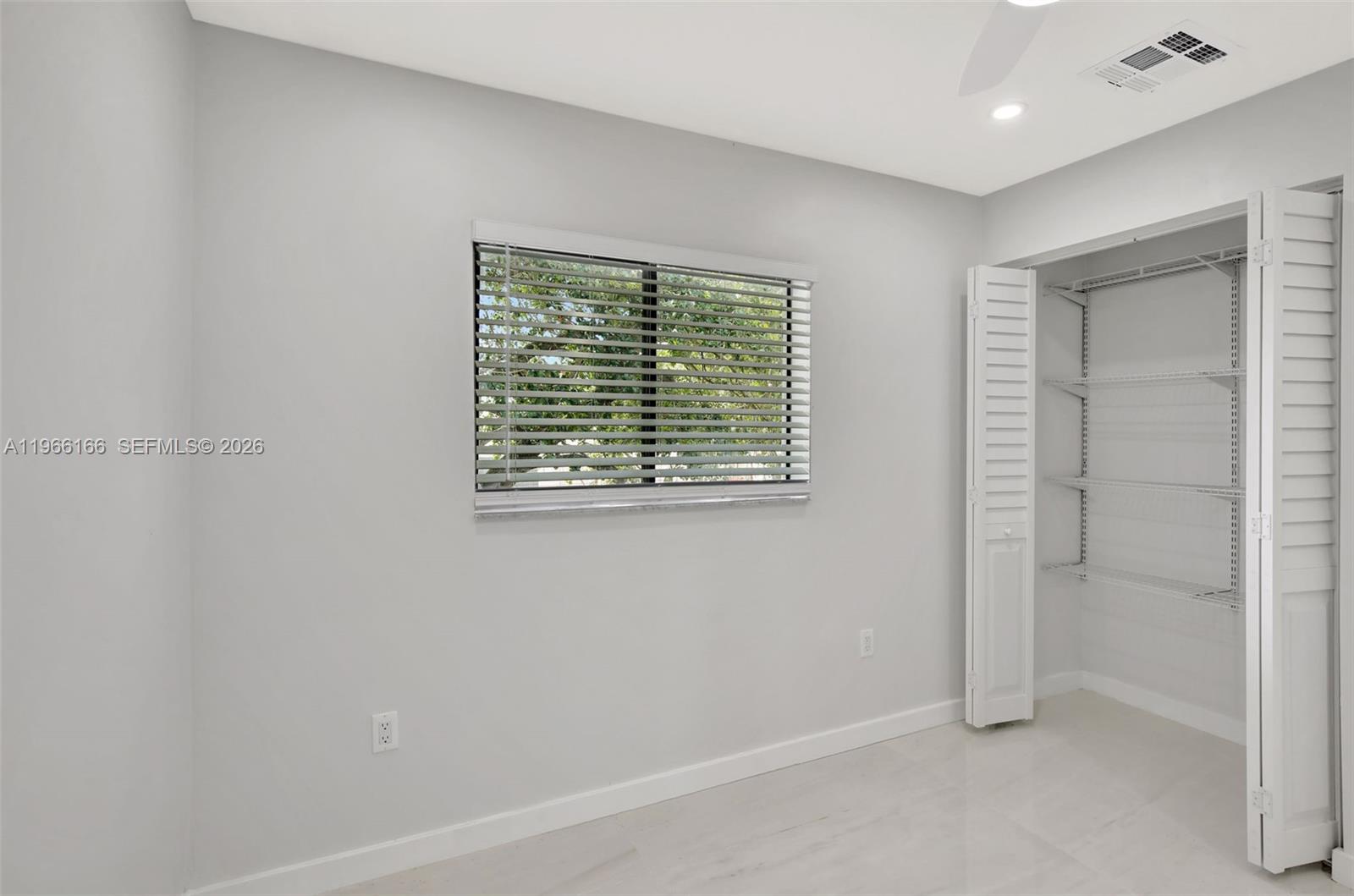 3916 Northwest 207 St Road Miami Gardens, FL 33055 - Photo 27 of 38 an empty room with windows