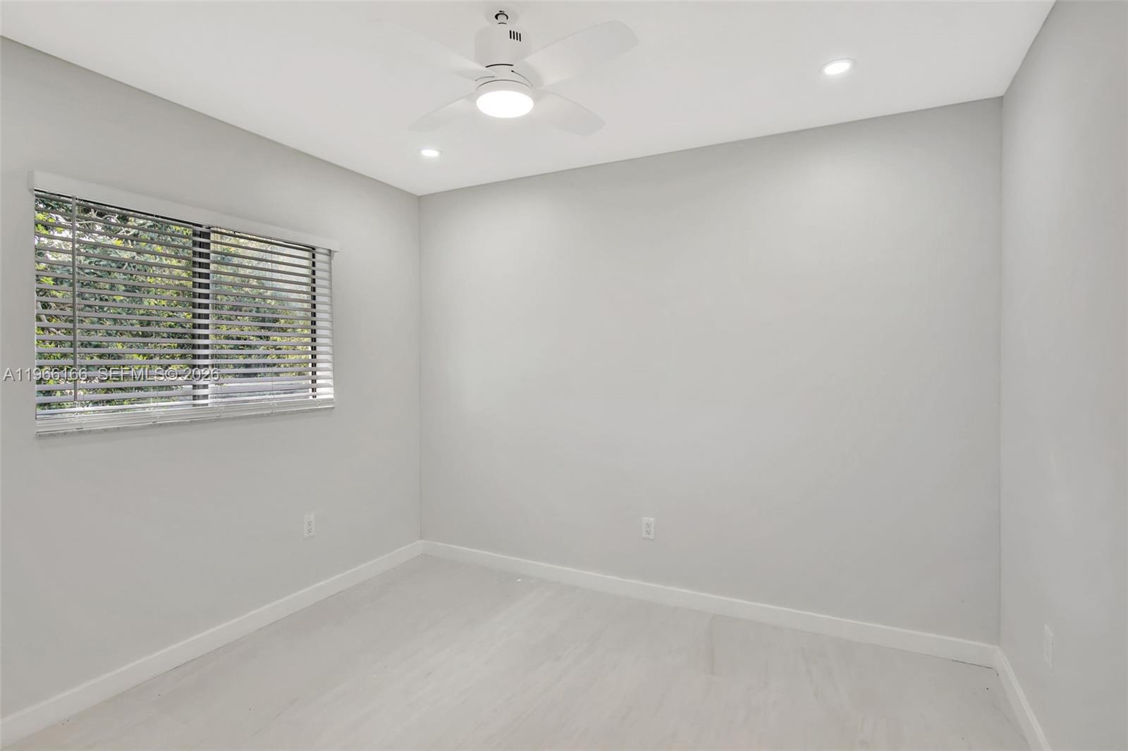 3916 Northwest 207 St Road Miami Gardens, FL 33055 - Photo 29 of 38 a view of an empty room with a window